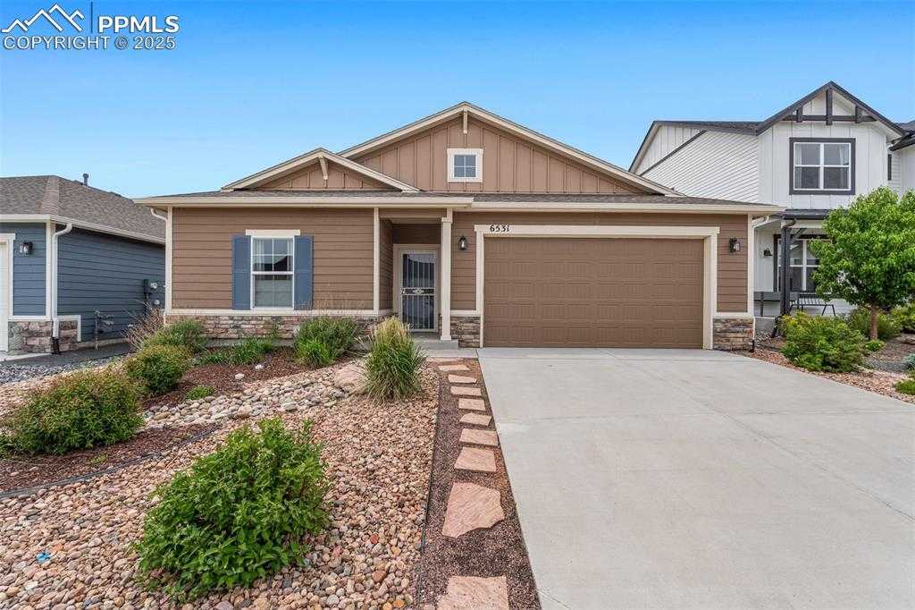 6531 Tumble Creek Dr photo 1 of 49